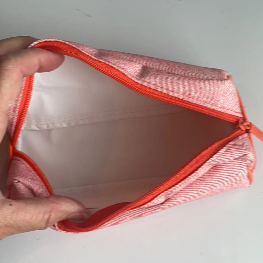 Clinique orange cosmetic bag